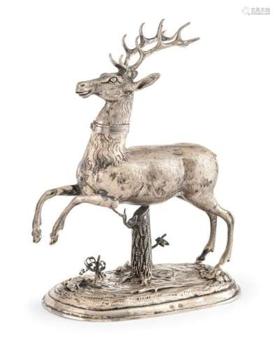 Drinking game in the form of a jumping stag. Late 19th/early 20th century. H. 25 cm. Baroque style. Jumping stag with removable head on landscape base. Apocryphal Nuremberg Inspection. About 563 gr. Minor signs of age. Provenance: From an old Württemberg collection.