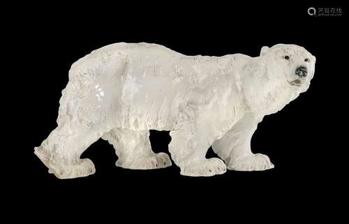 Big porcelain polar bear. Meissen, before 1924. L. 53 cm. Model by Otto Jarl from the year 1903 with naturalistically coloured decoration. Underglaze blue sword mark, model no. T181, embossing no. 6, minimum Chip.