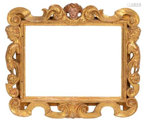 Renaissance frame. Italy/Florence(?), 16th century. 42 by 52 centimeters. Carved and gilded, partly polychrome painted. Rest. Alterssp. A similar frame is illustrated and described in : Italian Renaissance Frames, The Metropolitan Museum Of Art, No. 38, and C. Grimm, Old Picture Frames, p. 78.