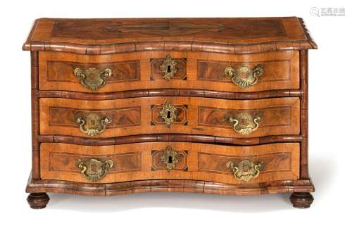 Baroque model chest of drawers. South German, 18th century. 33x55x27 cm. Three-clawed. Brass fittings. Rest. Alterssp. walnut, plum and others Provenance: From a large private collection in southern Germany.