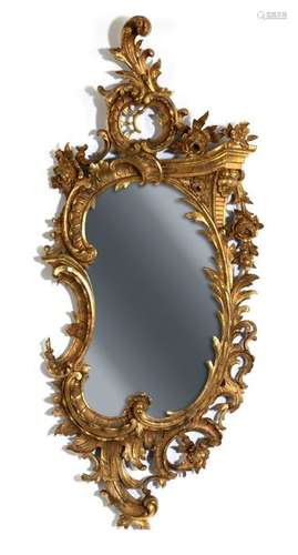 Magnificent mirror in rococo style. Probably southern Germany, 19th century. 160x70 cm. Carved and gilded. Best. Old-age-spawn residue. Provenance: According to the owner, the mirror was acquired in the 1990s when the Meininger Heimatmuseum was dissolved. See G. Child, Worlds of Mirrors, p. 228.