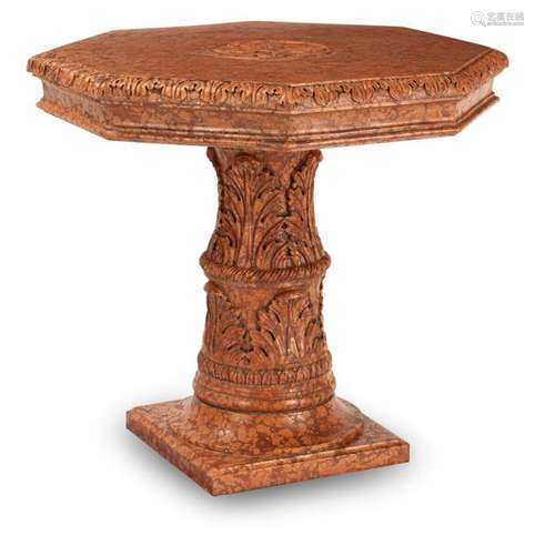 Octagonal marble table. Classicist style. H. 85/D. 97 cm. Two-piece. Red marble, slightly dam.