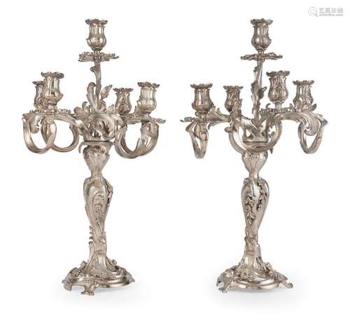 Pair of gorgeous girandoles. Louis XV style, France, 19th century. H. 58 cm. Five-flame. Silver-plated bronze. Age and usessp.