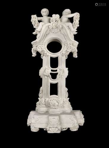 Magnificent, monumental grandfather clock case. Rococo style, probably Italy, circa 1900. H. 245 cm. Two-piece housing. Carrara Marble. Richly curved, solid base. Structure with numerous floral and ornamental decorations, blasted pediment and putti crowning. Rest. Age-Sp. Best.