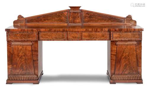 Large late Biedermeier desk. Around 1850. 115x200x63 cm. Four drawer units, two door compartments. Rest. Erg. Mod. Mahogany, partly carved. Provenance: From a large southern German private collection.