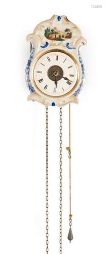 Jockey clock. Black Forest, 19th century. H. Seven inches. Wooden plate movement with brass wheels. Alarm clock, hour strike on bell and 1 day running time. Painted porcelain shield. White enamel dial with roman numerals, alarm disc and brass hands. Rest. Erg. agesp.