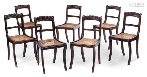 Set of seven chairs. England, 19th century. H. 87 cm. Mahogany, partly carved. Rest. woven seat. geriatric sp.