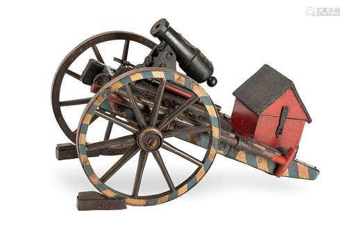 Small cannon on a gun carriage. Adolph Römheldt Friedrichshütte Solms/Leubach, pat. 1879. 99x52 cm. Cast iron, wood and other materials