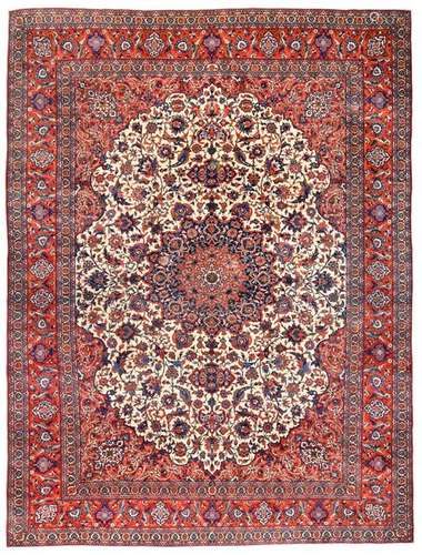 Fine Isfahan. Central Persia, c. 1950. 415 x 306 cm. The central, rosette-shaped main medallion is framed by splendid floral vine ornaments with set palmette blossoms and forked vines. Representative knotting work. Provenance: South German private property. Acquired in 1981 in the German specialized trade. - Insg. very well preserved. Both tying ends newly chained.