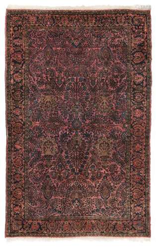 Reimport Sarouk. Western Persia, circa 1930. 198 x 129 cm. Dense, floral vines and stylised flowering shrubs cover the rose-coloured base. Provenance: From old South German private property. - Min. age and usessp. Shirasi renewed. Well preserved in the pile.