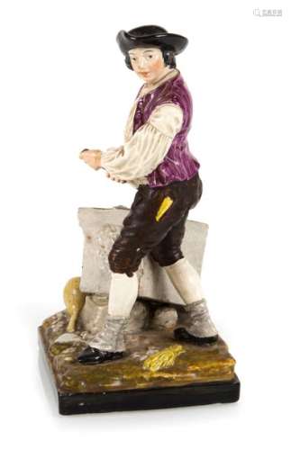 BRICKLAYER, PROBABLY EASTERN FRANCE,. 18TH/19TH CENTURY, COLORFULLY DECORATED. H. 20 CM.