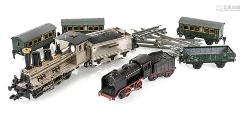 TWO LOCOMOTIVES AND VARIOUS CARS. MÄRKLIN. LOK L. 12/28.5CM.