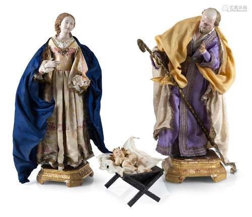 THREE NEAPOLITAN CRIB-. FIGURES, MAINLY 19TH CENTURY H. 17/72 CM. Provenance: Collection of the Stuttgart entrepreneur and art lover Wolfgang Osterloh.