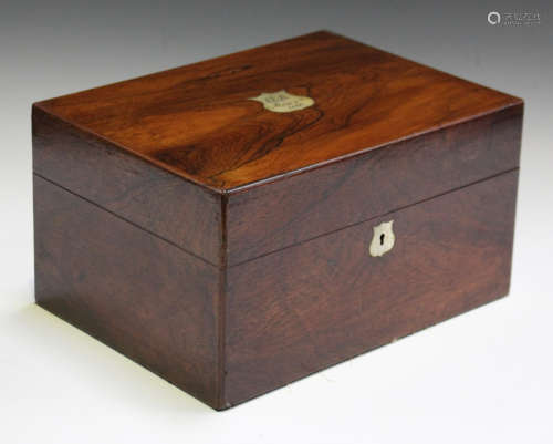 A mid-Victorian rosewood lady's vanity box, the interior fitted with plate-topped glass jars,