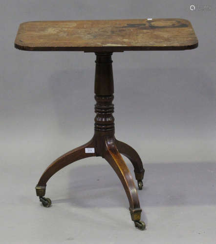 A Regency mahogany rectangular tip-top wine table, on a turned column and tripod legs, height