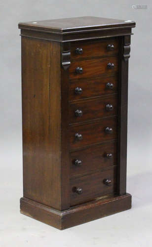 A Victorian mahogany Wellington chest by Maple & Co, fitted with seven drawers with turned