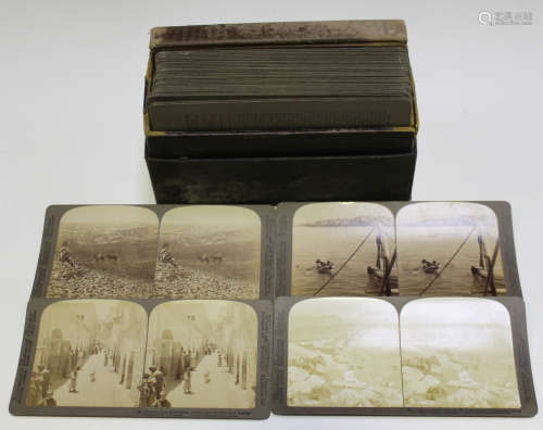 A Victorian leather photograph album, containing a selection of family portrait cartes-de-visite,