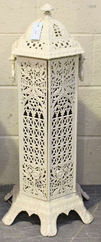 A late 19th/early 20th century white painted cast metal hexagonal conservatory heater of pierced