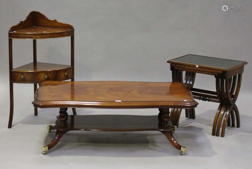 A 20th century reproduction mahogany coffee table, height 43cm, width 121cm, depth 71cm, together