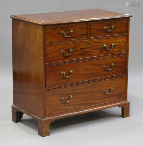 A late George III mahogany chest of two short and three long drawers, on bracket feet, height