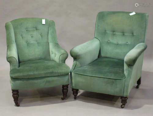 An Edwardian scroll armchair, upholstered in green velour, raised on ring turned legs and castors,