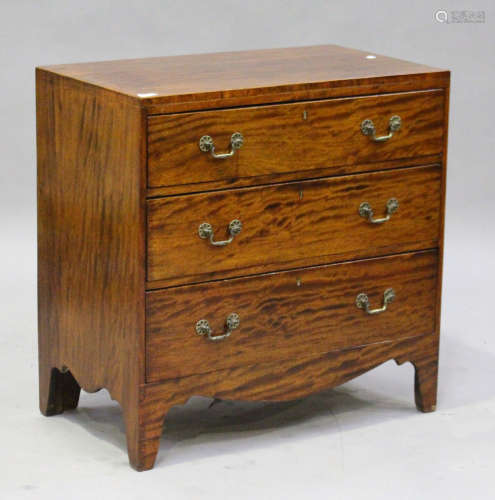 A George III mahogany chest of three long drawers, raised on bracket feet, height 81cm, width