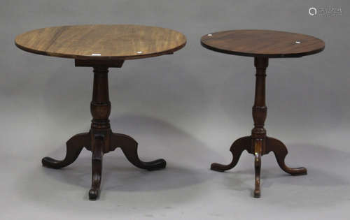 A George III mahogany circular tip-top wine table, the finely turned stem on tripod legs, height