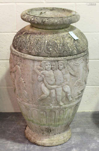 A 20th century cast composition stone garden urn of amphora form, the body decorated with a band