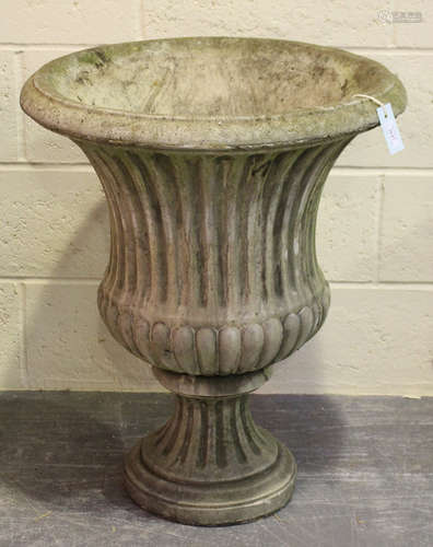 A 20th century cast composition stone garden urn of fluted campana form, height 72cm, diameter