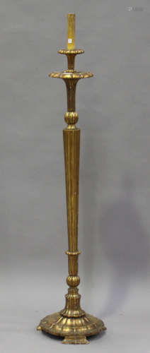 A 20th century Venetian giltwood lamp-standard, the reeded stem on a shaped base, height 153cm.
