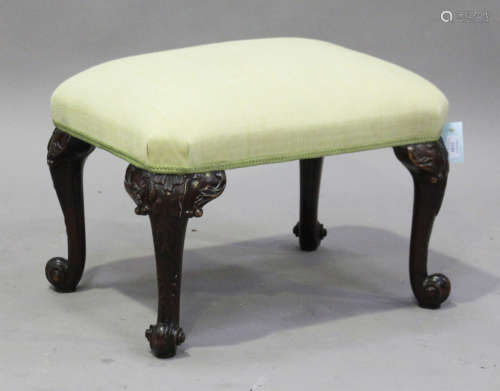 A 20th century Chippendale style mahogany stool, the overstuffed seat raised on carved cabriole legs
