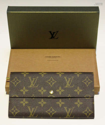 A Louis Vuitton monogram canvas purse, the interior with zip compartment, length 19cm, together with
