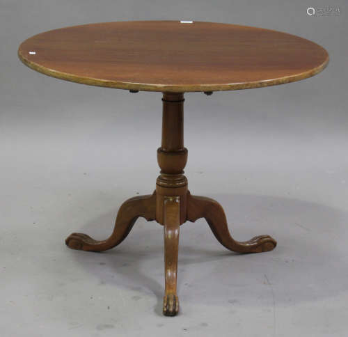 A 19th century walnut circular tip-top wine table, raised on a turned column and tripod cabriole