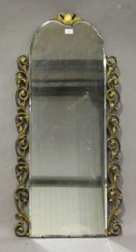 A 20th century Italianate gilt composition mounted arched wall mirror with shell surmount, 111cm x