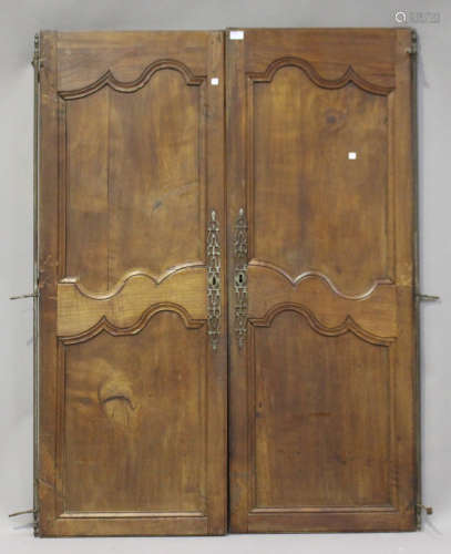 A pair of 19th century French armoire doors with wrought metal hinges, height 154cm, width 58cm.