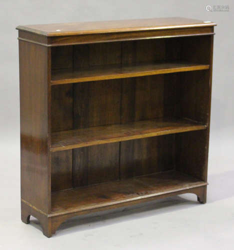 A 20th century Victorian style mahogany open bookcase, fitted with adjustable shelves, on bracket