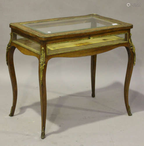 A late 19th century Rococo Revival rosewood and foliate inlaid bijouterie table, the hinged top