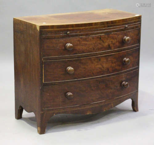 A Victorian mahogany bowfront chest of three long drawers, on bracket feet, height 86cm, width 98cm,