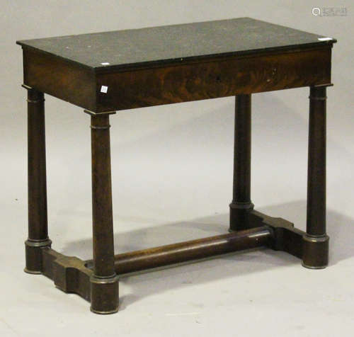 A Regency flame mahogany pier table with black marble top above a single drawer, raised on turned