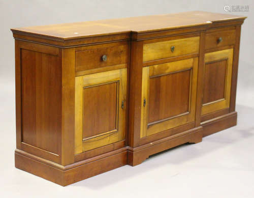 A modern French cherry 'Grange' breakfront sideboard, fitted with drawers above cupboards, on a