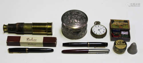 A group of collectors' items, including an Indian silver plated cylindrical box, detailed 'Goopee