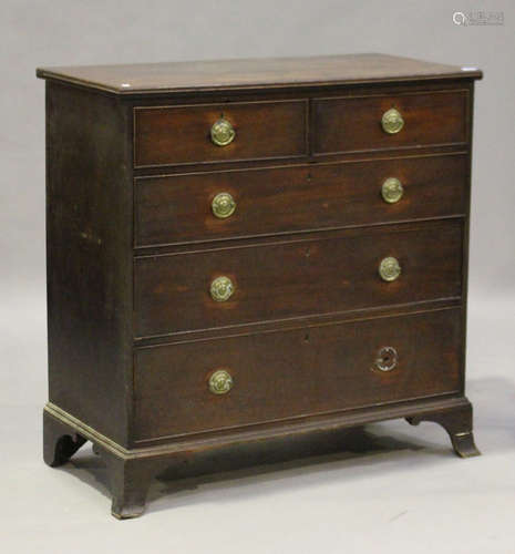 A George III mahogany chest of two short and three graduated long drawers, on splayed bracket