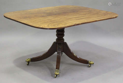 A late George III mahogany rectangular tip-top breakfast table, raised on a turned column and reeded