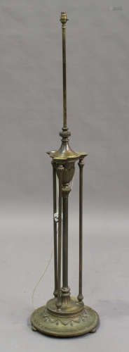 An early 20th century brass telescopic lamp-standard of Neoclassical design, height 165cm.Buyer’s
