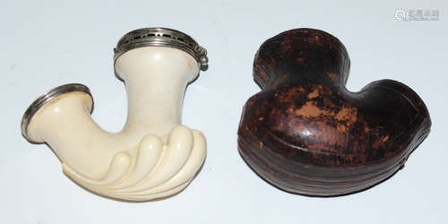 A 19th century German carved meerschaum and white metal mounted pipe of heavy gadrooned form, the