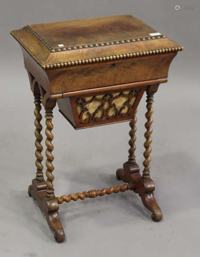 A mid-19th century Continental mahogany work table, the hinged lid revealing a mirror above a