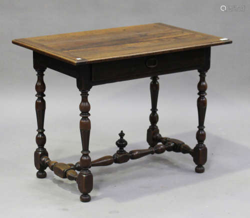 An early 18th century and later walnut side table, fitted with a single frieze drawer, on turned and
