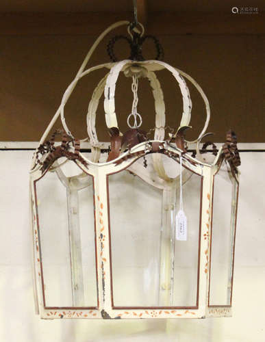 A mid-20th century French painted wrought metal hexagonal ceiling lantern, inset with glass