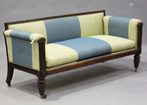 A Regency simulated rosewood settee, upholstered in blue and yellow wide striped fabric, the