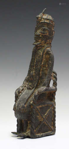 An African Benin style figure of a seated tribal leader, height 25cm.Buyer’s Premium 29.4% (